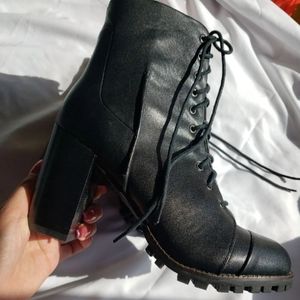 Leather black combat boots with heel